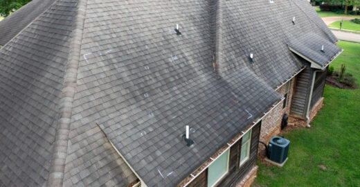 Roof with hail damage and chalk markings from inspection